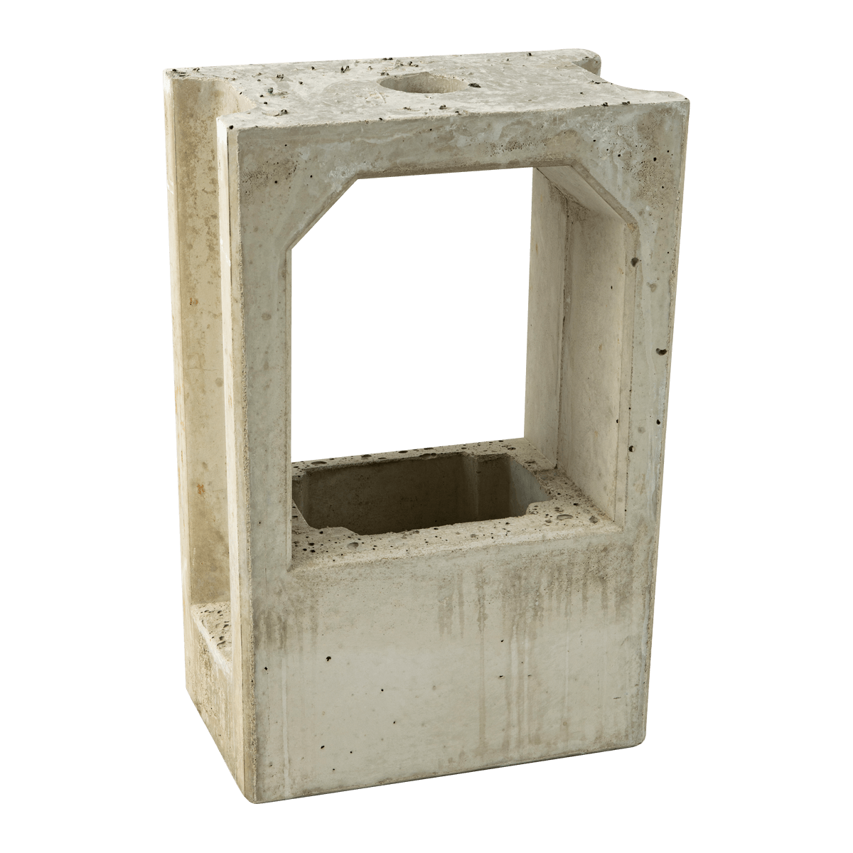 De Alfen Betonnen voor Eve laadpaal sokkel voor montagepaal is een holle, rechthoekige betonnen sokkel met strakke randen en een open midden. Het oppervlak heeft kleine vlekken en imperfecties, wat wijst op blootstelling aan de elementen.