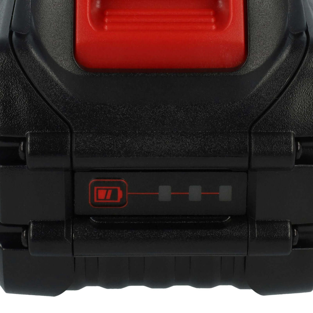 Close-up van een zwart apparaat met een DCB606 accu voor Dewalt 20V Max, met een batterij-indicator met vier segmenten, waarvan er slechts één brandt. Het apparaat heeft een rode knop of hendel bovenaan.